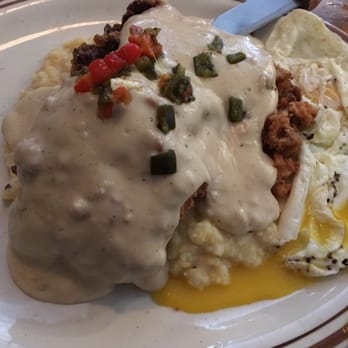 Ladybird Diner - Chicken fried steak and jalapeño cream gravy with grits and eggs, over medium...Gigantic and delicious!! - Cafes Near Me - Lawrence, Kansas Ladybird Diner - Chicken fried steak and jalapeño cream gravy with grits and eggs, over medium...Gigantic and delicious!! - Cafes Near Me - Lawrence, Kansas