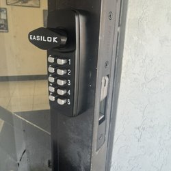 Best Locksmith - Mechanical combination lock install on a common commercial glass door.