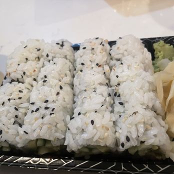 Okinawa Steak & Sushi - a plate of sushi and a bowl of dipping sauce - Japanese Near Me - Canton, Georgia