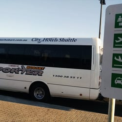 Airporter City Hotels Shuttle - Airport Shuttle - Parked Outside Baggage Carousel Exit