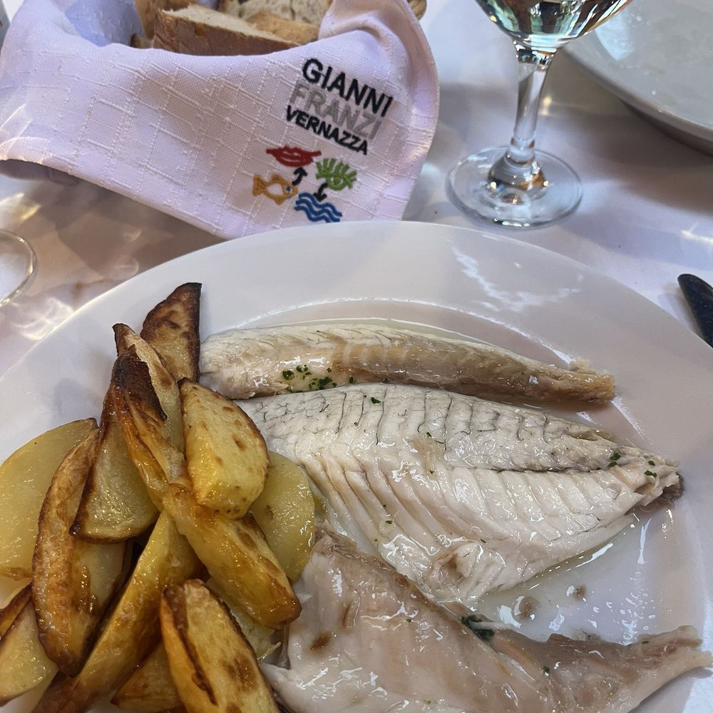 Gianni Franzi - Baked fish of the day with potatoes - Italian Near Me - Vernazza, SP Gianni Franzi - Baked fish of the day with potatoes - Italian Near Me - Vernazza, SP