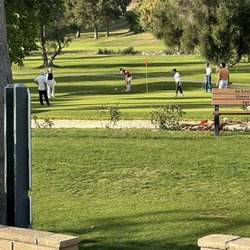 Canyon Crest Country Club - Count the number of players on this green.