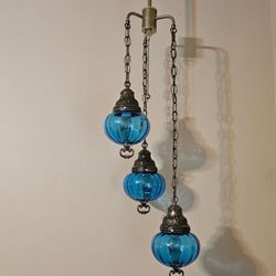 J & C Lighting - Before the repair showing the original staggered positions of the globes.