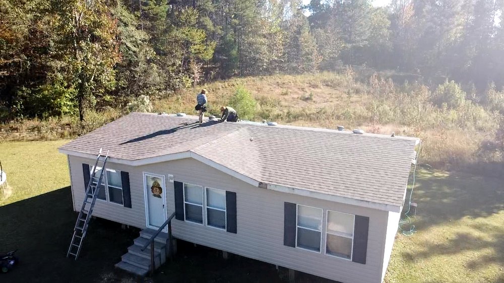 Slide of Evan's Roofing & Construction