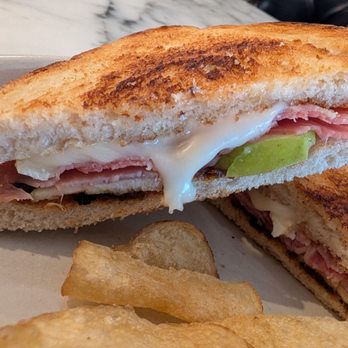 Romancing the Bean Cafe - Close up of the Brie and Apple Sandwich with added Prosciutto - Coffee & Tea Near Me - Burbank, California Romancing the Bean Cafe - Close up of the Brie and Apple Sandwich with added Prosciutto - Coffee & Tea Near Me - Burbank, California