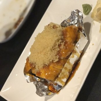 Birmingham Sushi Cafe - The roll drenched in sauce. There was actually more sauce at the bottom of the foil. - Sushi Bars Near Me - Birmingham, Michigan