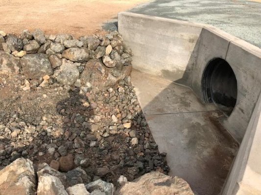Storm Drains - Storm drains help prevent flooding by diverting rainwater off of the streets and other paved surfaces and into a natural body of water. We also do U-ditches and curb gutters.
