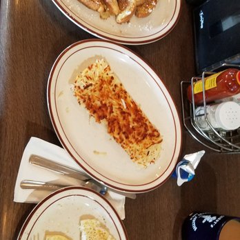 Sandy's Country Junction - French toast, hash browns, 2 eggs over medium well, and bacon. Yum! - Coffee & Tea Near Me - Clovis, California