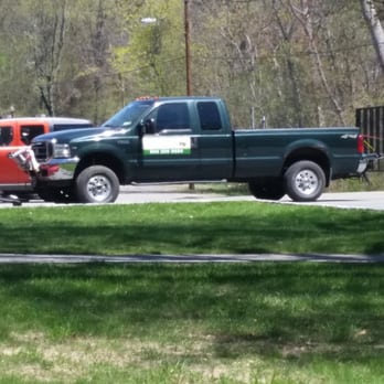 Creative Visions Landscaping - a pickup truck and a snow plow - Landscaping Near Me - Glenham, New York