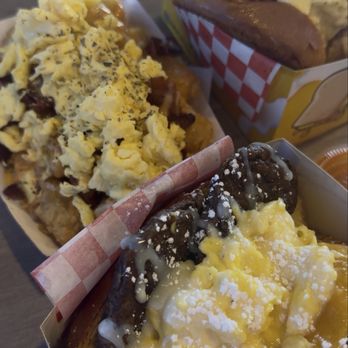 Buldogis Eatery - from bottom to top: turkey sausage egg drop, breakfast tots w scrambled eggs, BFC egg drop sandwich - Hot Dogs Near Me - Las Vegas, Nevada Buldogis Eatery - from bottom to top: turkey sausage egg drop, breakfast tots w scrambled eggs, BFC egg drop sandwich - Hot Dogs Near Me - Las Vegas, Nevada