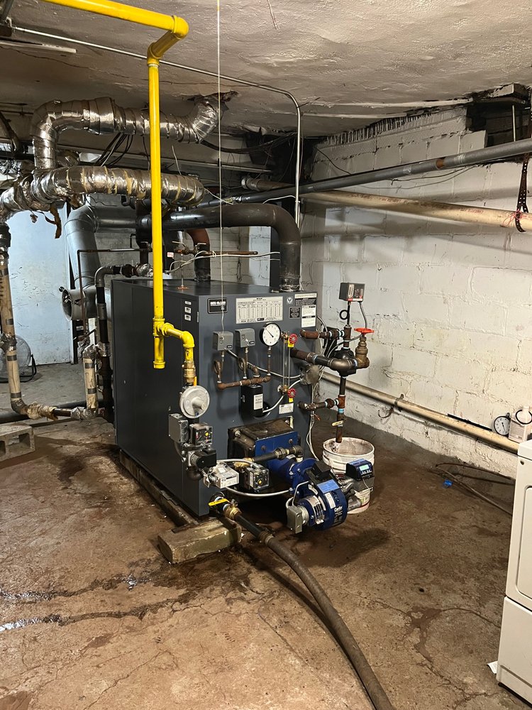 Slide of JMK Plumbing & Heating