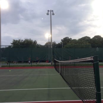 Bicentennial Park - Tennis courts and basketball court behind - Dog Parks Near Me - Oldsmar, Florida