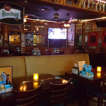 Ye Olde Falcon Pub - The back of bar, notice the taps on the ceiling. - Pubs Near Me - Davie, Florida Ye Olde Falcon Pub - The back of bar, notice the taps on the ceiling. - Pubs Near Me - Davie, Florida