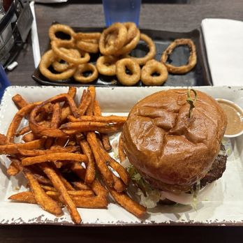 Basement Burger Bar - BYOB - Brioche bun, Ground Beef Burger, lettuce, tomato, onion, bacon and chipotle mayo. Sweet Potato Fries and Onion Ring Half Order. - American Near Me - Detroit, Michigan Basement Burger Bar - BYOB - Brioche bun, Ground Beef Burger, lettuce, tomato, onion, bacon and chipotle mayo. Sweet Potato Fries and Onion Ring Half Order. - American Near Me - Detroit, Michigan