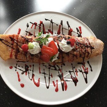 Mangrove Cafe & Bakery - This is our fresh fruit filled crepe! It's very delicious and oh so filling. You can split with a friend or indulge all by yourself! - Thai Near Me - Spokane Valley, Washington Mangrove Cafe & Bakery - This is our fresh fruit filled crepe! It's very delicious and oh so filling. You can split with a friend or indulge all by yourself! - Thai Near Me - Spokane Valley, Washington
