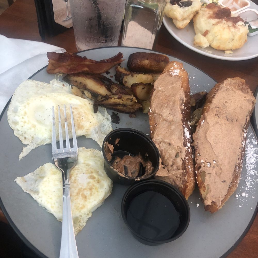 Clear Sky Cafe - French toast with cinnamon butter, roast potatoes and over medium eggs. Excellent! - New American Near Me - Clearwater, Florida