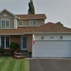 Paragon Contracting & Renovations - House before new roof