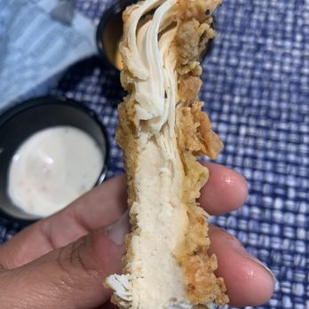 Brgr Shack - A piece of their tenders - not seasoned well - Burgers Near Me - Escondido, California Brgr Shack - A piece of their tenders - not seasoned well - Burgers Near Me - Escondido, California