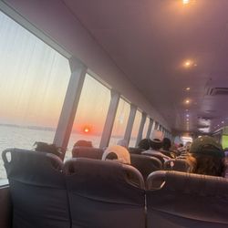 NYC Ferry-Bay Ridge - In doors at dusk, watching the sun set over New Jersey