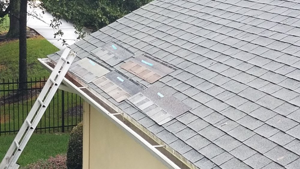 Slide of Top Notch Roofing