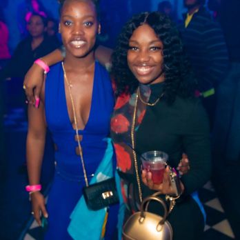 Hush Lounge - two women at a party - Dance Clubs Near Me - Houston, Texas