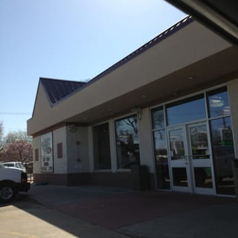 bp - a car parked in front of a building - Gas Stations Near Me - Plano, Illinois