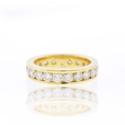 Hydrate - Shop luxury round diamond eternity bands in Memphis. Expert craftsmanship, GIA-certified diamonds, perfect for weddings or everyday wear.