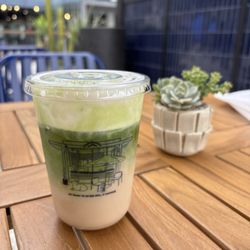 Matcha latte with pistachio syrup and pistachio milk