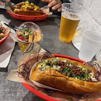 Dirt Dog Downey - Pastrami dog on a lobster bun; dirty dog (chorizo); carne asada fries; flamin hot esquire. Everything was delish! - Hot Dogs Near Me - Downey, California Dirt Dog Downey - Pastrami dog on a lobster bun; dirty dog (chorizo); carne asada fries; flamin hot esquire. Everything was delish! - Hot Dogs Near Me - Downey, California
