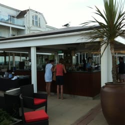Sandbanks Hotel - Terrace bar "Beach Club" ...the seagul likes to stay on top!