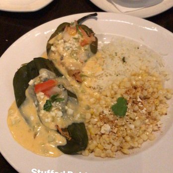 Urban Agave - Half of the Urban Burrito and 1 of the 2 Stuffed Poblano Peppers. - Gastropubs Near Me - Glendale, Arizona Urban Agave - Half of the Urban Burrito and 1 of the 2 Stuffed Poblano Peppers. - Gastropubs Near Me - Glendale, Arizona