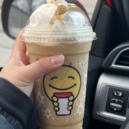 a person holding a cup of coffee a person holding a cup of coffee