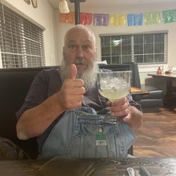 La Familia Mexican Restaurant - My partner happy with Cadillac margarita!!