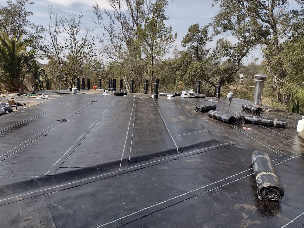 Slide of Mendez roofing