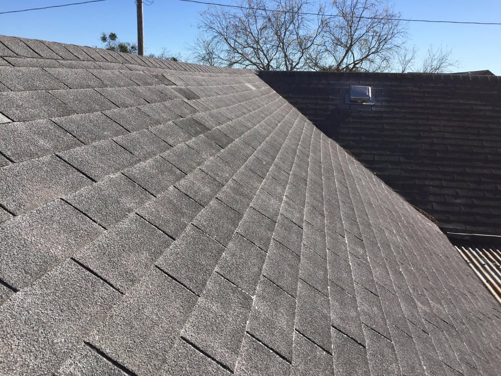 Slide of Tim's Roofing