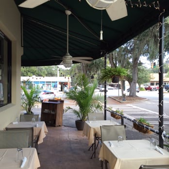 Del Sur Artisan Eats - The shady porch at Del Sur - Steakhouses Near Me - Saint Simons Island, Georgia