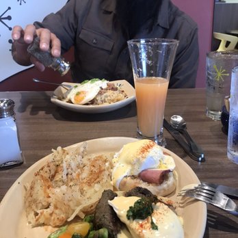 Snooze, an A.M. Eatery - Eggs Benedict .. one with steak one regular. And he had the deluxe something I forgot the name .. it had sausage and bacon - Breakfast & Brunch Near Me - Orange, California