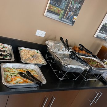 Ige's Catering Service - Uncovered pans-Andagi and shoyu pork. - Caterers Near Me - Honolulu, Hawaii