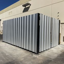 Mesa Fence - 8' corrugated sheet metal with 6x6 posts and interior frame work. (2) 11' double gates
