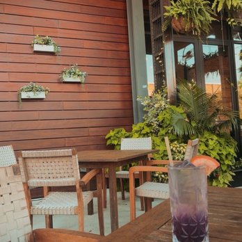South Front Tavern - Outside seating area featuring the purple haze - American Near Me - Wilmington, North Carolina South Front Tavern - Outside seating area featuring the purple haze - American Near Me - Wilmington, North Carolina