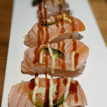 East Izakaya - Salmon Pinwheel with Eel and Aburi Salmon Oshi. - Japanese Near Me - St Catharines, Ontario East Izakaya - Salmon Pinwheel with Eel and Aburi Salmon Oshi. - Japanese Near Me - St Catharines, Ontario