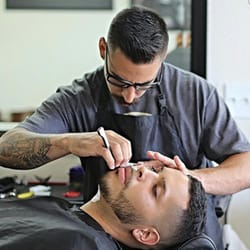 Traditions Hair Company - Old fashioned hot towel razor shave done by shop owner Jeremy