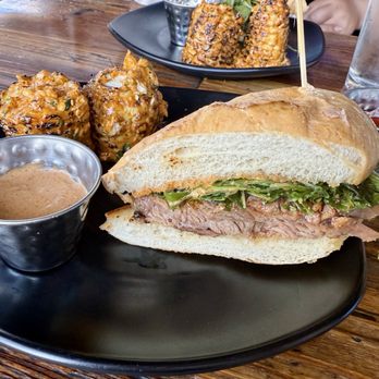 Whiskey 'N Rye Smokehouse - Smoked Brisket Sandwich w/ elote corn (split plate) - Barbeque Near Me - Solvang, California Whiskey 'N Rye Smokehouse - Smoked Brisket Sandwich w/ elote corn (split plate) - Barbeque Near Me - Solvang, California