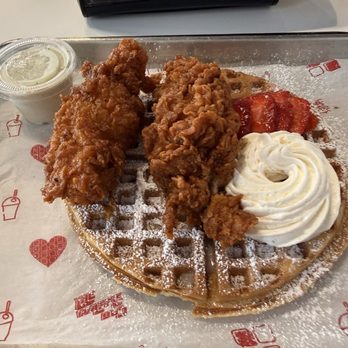 The Waffle Bus Cypress - Waffle topped w/ Strawberries with hot and honey tenders. - Waffles Near Me - Cypress, Texas The Waffle Bus Cypress - Waffle topped w/ Strawberries with hot and honey tenders. - Waffles Near Me - Cypress, Texas