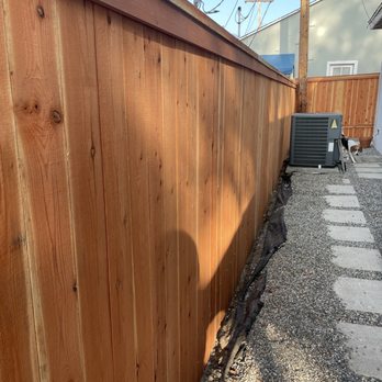 Ramirez Fence Company - Redwood fence on backside of house. Ignore the black weed barrier paper, we still have some landscaping to do. - Fences & Gates Near Me Ramirez Fence Company - Redwood fence on backside of house. Ignore the black weed barrier paper, we still have some landscaping to do. - Fences & Gates Near Me
