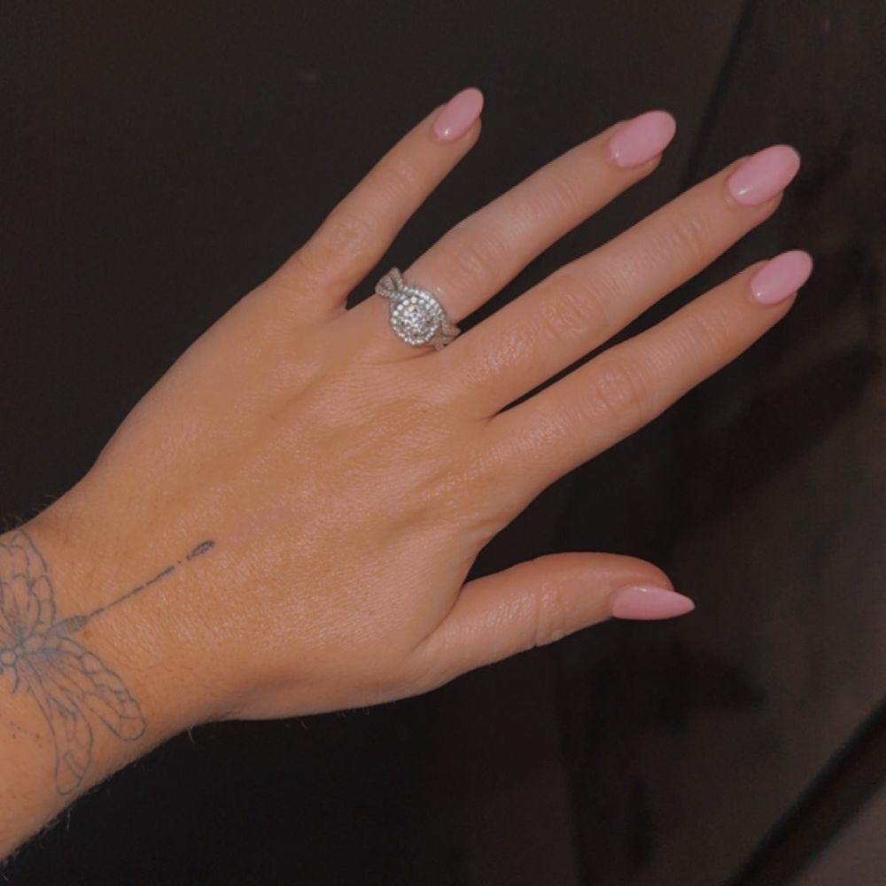 Almond shape acrylic nails with gel polish on top Almond shape acrylic nails with gel polish on top