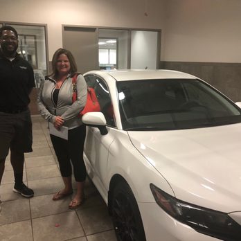 Earnhardt Toyota - Justin Addie- former Mesa Graduate from Skyline High School and my wife Jennifer Wolf next to our new Leased 2021 Camry SE - Car Dealers Near Me - Mesa, Arizona