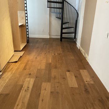 Rosas Flooring - a spiral staircase in an apartment - Flooring Near Me Rosas Flooring - a spiral staircase in an apartment - Flooring Near Me