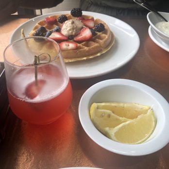 Another Broken Egg Cafe - Strawberry St. Germain Mimosa, 10oz (9% ABV) Mixed Berry Waffle - Breakfast & Brunch Near Me - Houston, Texas Another Broken Egg Cafe - Strawberry St. Germain Mimosa, 10oz (9% ABV) Mixed Berry Waffle - Breakfast & Brunch Near Me - Houston, Texas