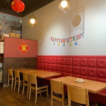 Yunnan Restaurant - a red booth with wooden tables and chairs - Chinese Near Me - San Gabriel, California